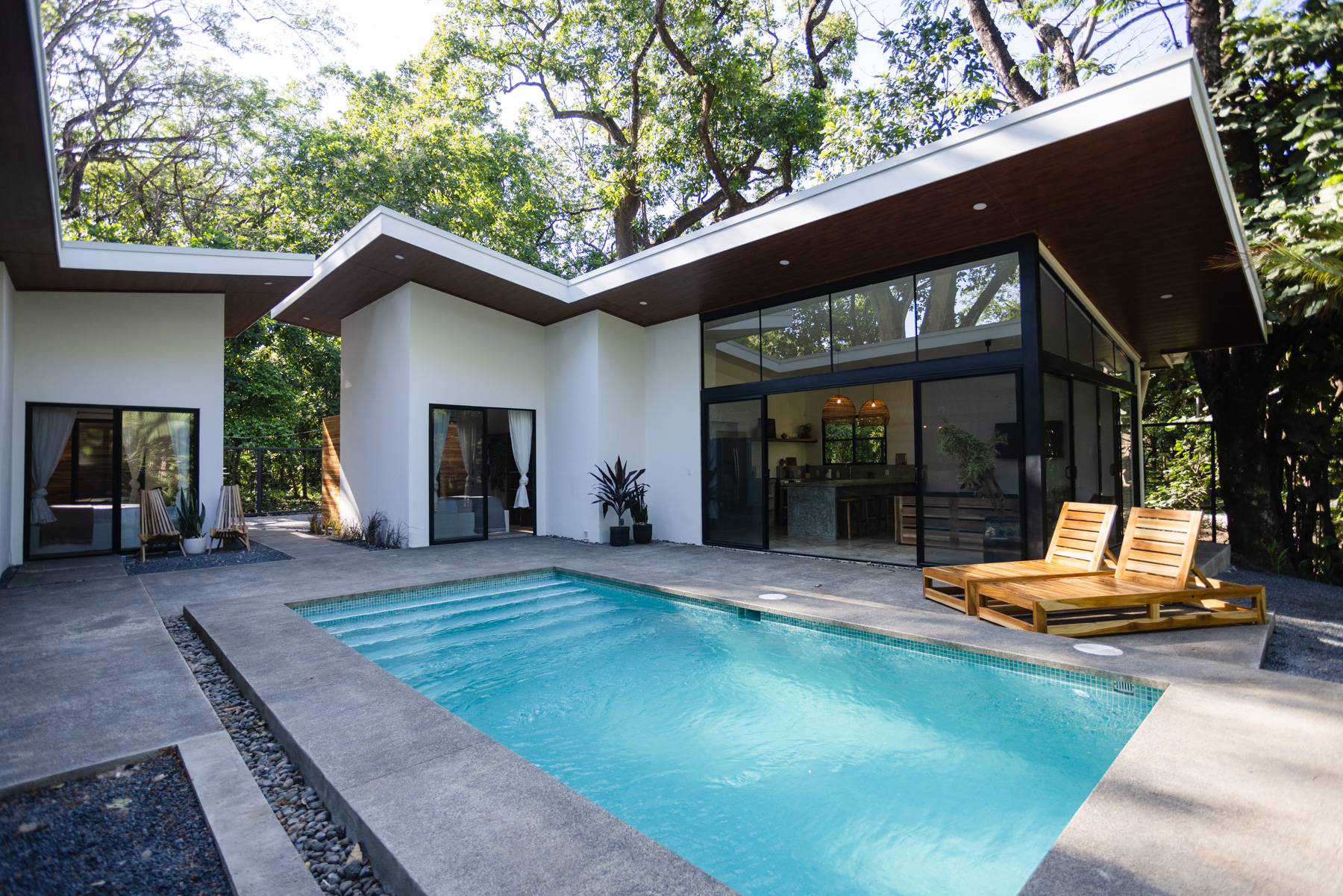 Kembar I exterior with pool and modern architecture